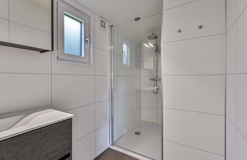 Aalst Ski Chalet | ✓ Natuurlodge at Recreatiepark het Esmeer ✓ Holiday home for 4 persons ✓ Located in Aalst (Gelderland) ✓ Waterside holiday park ✓ Book directly through the park
