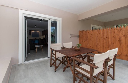 Alonia Apartment | Nestled on the ground floor with direct garden access amidst olive trees