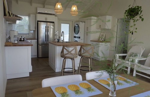 Great Exuma Villa | NEW 2 bdrm Sunrise Villa on 1+ acre tropical garden directly on Hoopers Beach