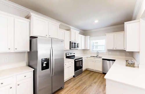 Carrabelle House | New dog-friendly home near beach & golf with pool, arcade game, decks, W/D, AC