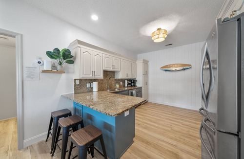 Thomas Drive House | NEW! Family Retreat - Pickleball, Bball, Pool, Game Rm, Bunk Rm, Beach 1.4 mi