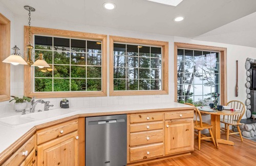 Dunes City House | New Listing! Beautiful Lakefront home w/amazing lake views, private dock, hot tub, and gameroom