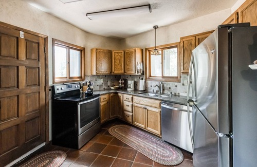 Angel Fire House | New listing! Lovely home filled with character w/ cozy fireplace and large patio
