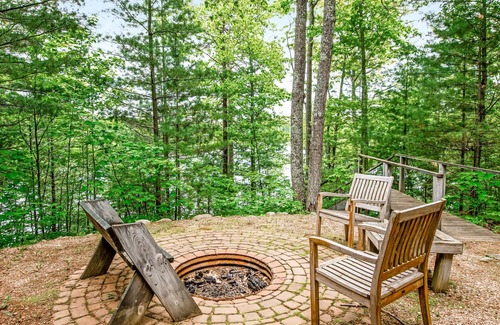 Lac du Flambeau House | New listing! Rustic retreat in the woods w/ wood-burning fireplace & large deck!