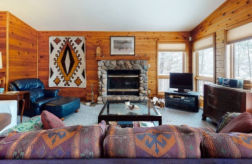 Lac du Flambeau House | New listing! Rustic retreat in the woods w/ wood-burning fireplace & large deck!