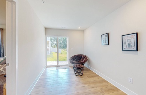 Ocean City House | Newly built row-end townhome with water view, pool access, patio, & balcony