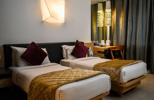 Kozhikode Hotel | Nexstay Asma Tower