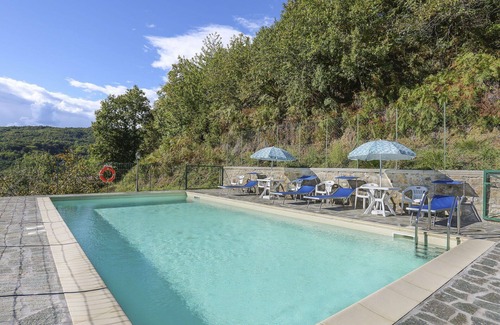 Villa Collemandina Villa | Nice apartment in villa for 3 guests with pool, WIFI, terrace and pets allowed