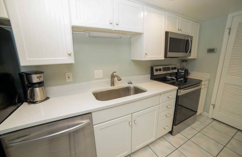 Bel Air Condo | Nicely Updated Beachfront 2BR (Sleeps 8) With ocean view and convenient parking.