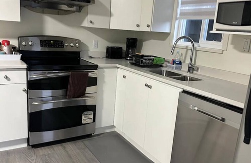 Delta House | North delta guest suite with kitchen