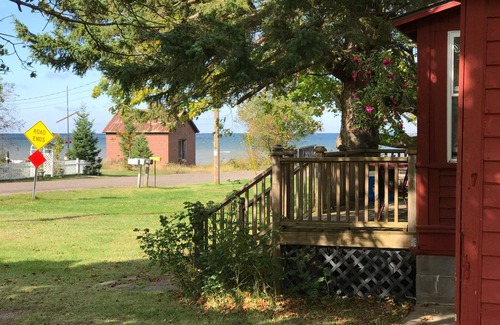 Laurium Cottage | NORTHERN LIGHTS! Historic Storybook Beach Cottage at Tamarack Waterworks