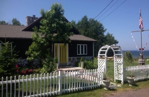 Laurium House | NORTHERN LIGHTS! Stately 5 bedroom beach house on Lake Superior.
