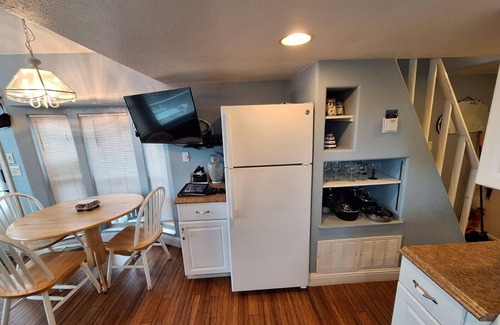 Smith River Cabin | Ocean Cabin 23 is a cozy seaside bungalow with loft, limited ocean views, and private beach. Hot tub temporarily unavailable