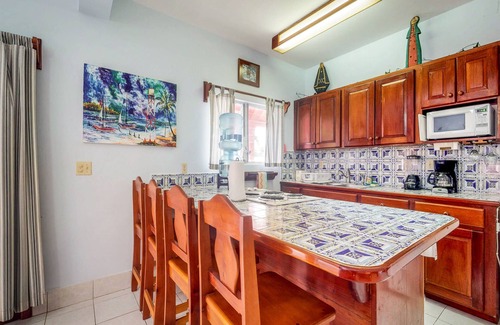 San Pedro Condo | Ocean-view apartment in a beachfront resort with shared pool, WiFi & partial AC