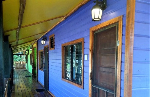 Gales Point Apartment | Ocean View Beachfront Purple Cabana 1, AC, Wi-Fi, Swm Pool Access...