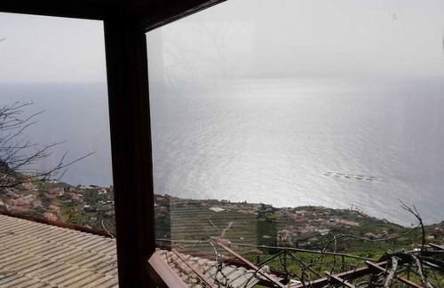 Arco da Calheta Cottage | Ocean View Cottage - Stone rocks house with e beautiful ocean view.