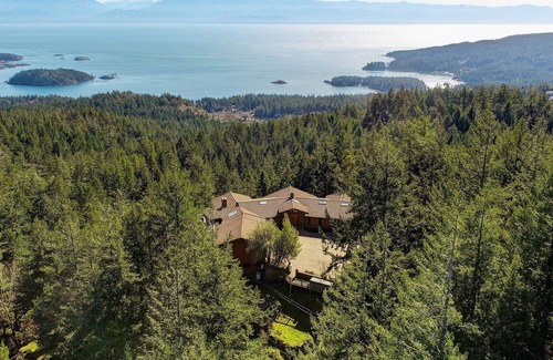 Metchosin House | Ocean-view estate surrounded by trees, perched atop Mount Matheson. Sleeps 12!