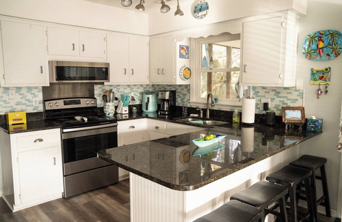 Emerald Isle Cottage | Ocean view family cottage, just steps from the sea and close to everything.