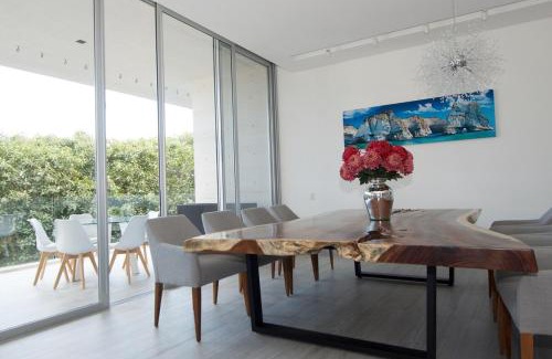 Playacar Apartment | Ocean View Pool in Exclusive Playacar, En-Suite Rooms
