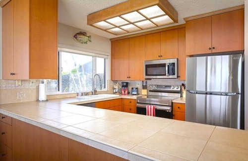 Historic Kailua Village Condo | Oceanfront 2nd Floor Corner Unit. Largest two bedroom that sleeps 5 in beds! D18
