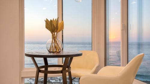 Village of La Jolla Apartment | Oceanfront in La Jolla Steps to Beach Shops Dining Dawn Patrol by AvantStay