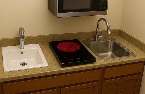 Wheatland Hotel | OKC Del Sol Casa Suites- Extended Stay