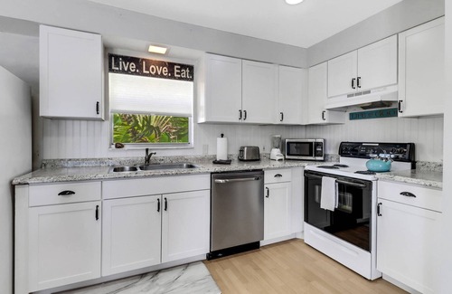 Bonita Bay House | Old Florida Waterfront Duplex! Close to Beach! Bikes, Kayak & Over $100 of Free Daily Activities!