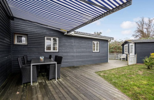 Maribo House | On the quiet island of Askø, this beautiful vacation home near the beach welcomes you.