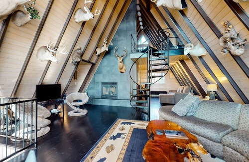 Eagle River House | One-of-a-kind lakefront A-frame overlooking Echo Lake with theater room
