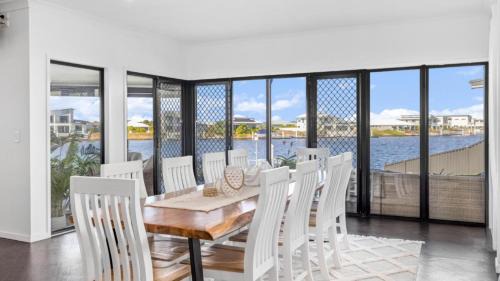 Banksia Beach House | Opulent Canal-Front Retreat