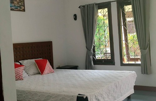 Mangsit Hotel | OYO 2864 Mangsit Garden Homestay
