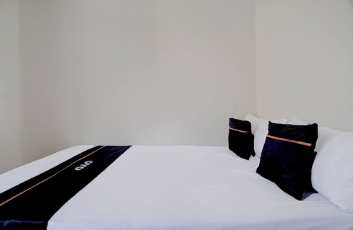Dinoyo Hotel | OYO 94766 Tapak Liman Syariah