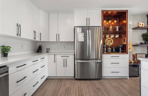 Northeast Edmonton House | Pac-Man fun, pet-friendly comfort, and cozy vibes near Downtown Edmonton