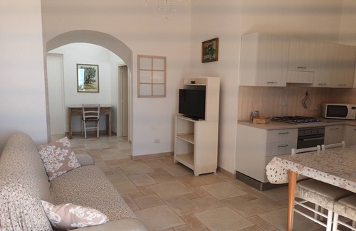 L'Assunta Villa | Panoramic trulli for 7 people in the hills with exclusive swimming pool 8 km from the sea