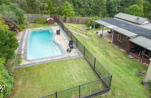 Booral Cottage | Paperbark - A tranquil eco-friendly rural retreat with privacy and a pool.