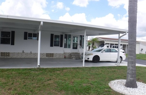 Florida South Atlantic Coast House | Par Fairway Escape. Escape into the golf community of Lily Lake