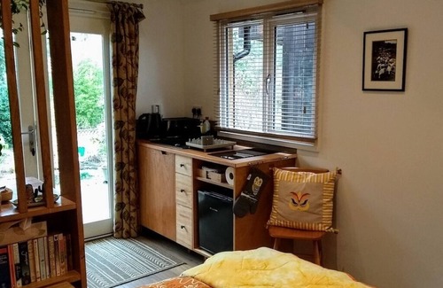 Westbury Apartment | Peaceful separate annexe with bed, kitchen, shower room and patio area.