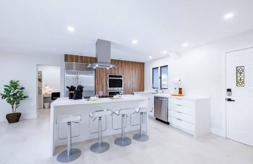Gulf Cove House | Pelican Lakefront Villa with Sunset Deck, Private Hot Tub, Games and BBQ