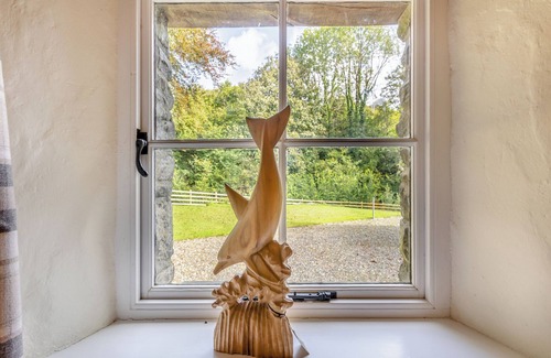 Bontnewydd Cottage | Penpompren is a beautiful thatched cottage located in the Cambrian Mountains.