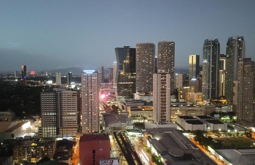 Highway Hills Apartment | Penthouse 1 at Urban Deca EDSA by CityStudio