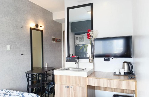 Highway Hills Apartment | Penthouse 1 at Urban Deca EDSA by CityStudio
