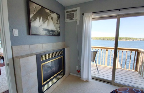 Arnolds Park Condo | Penthouse Suite, gorgeous West Lake Okoboji views, 1 BDRM above shopping center