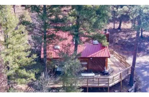 Ruidoso Cabin | Perched in the pines -wrap around porch w/outdoor dining, fire pit, & wildlife