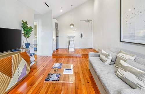 Irish Channel Apartment | Perfect Escape in Downtown W/ Shared Hot Tub, Steam Rooms, Sun Deck & Fast WiFi!