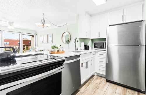 Banana River Estates Condo | Perfect Family Getaway Steps from Cocoa Beach Pier with Oceanfront Heated Pool