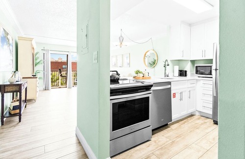 Banana River Estates Condo | Perfect Family Getaway Steps from Cocoa Beach Pier with Oceanfront Heated Pool
