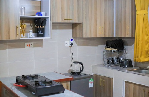 Kisumu Apartment | Perfect Getaway: Quiet, 1-Bedroom Private Balcony. Walk to Kisumu Airport.