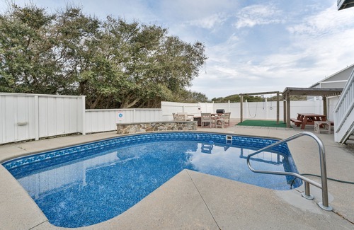 Sea Scape House | Pet-friendly Kitty Hawk home with private heated pool, volleyball court, and more
