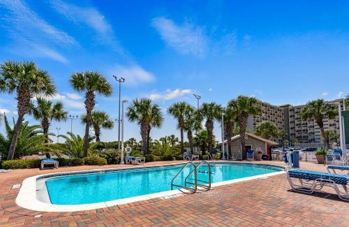 Sunnyside House | Pinnacle Port #115A by Book That Condo