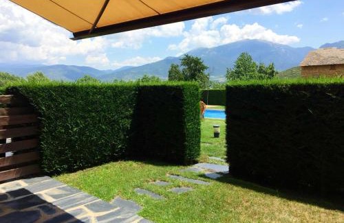 Olopte Apartment | Planta baja con jardín y piscina en Olopte